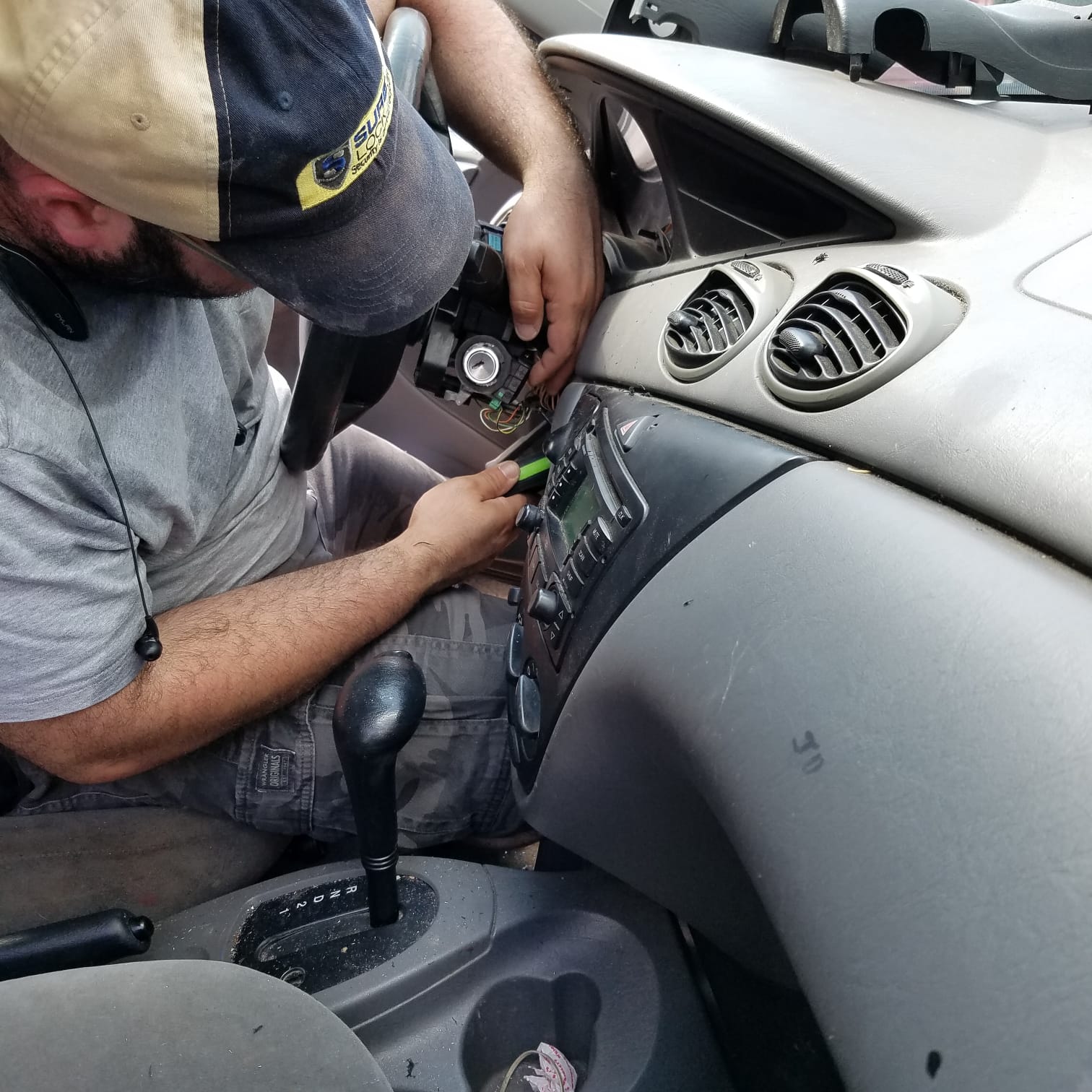 SLK Services technician working on vehicle interior systems